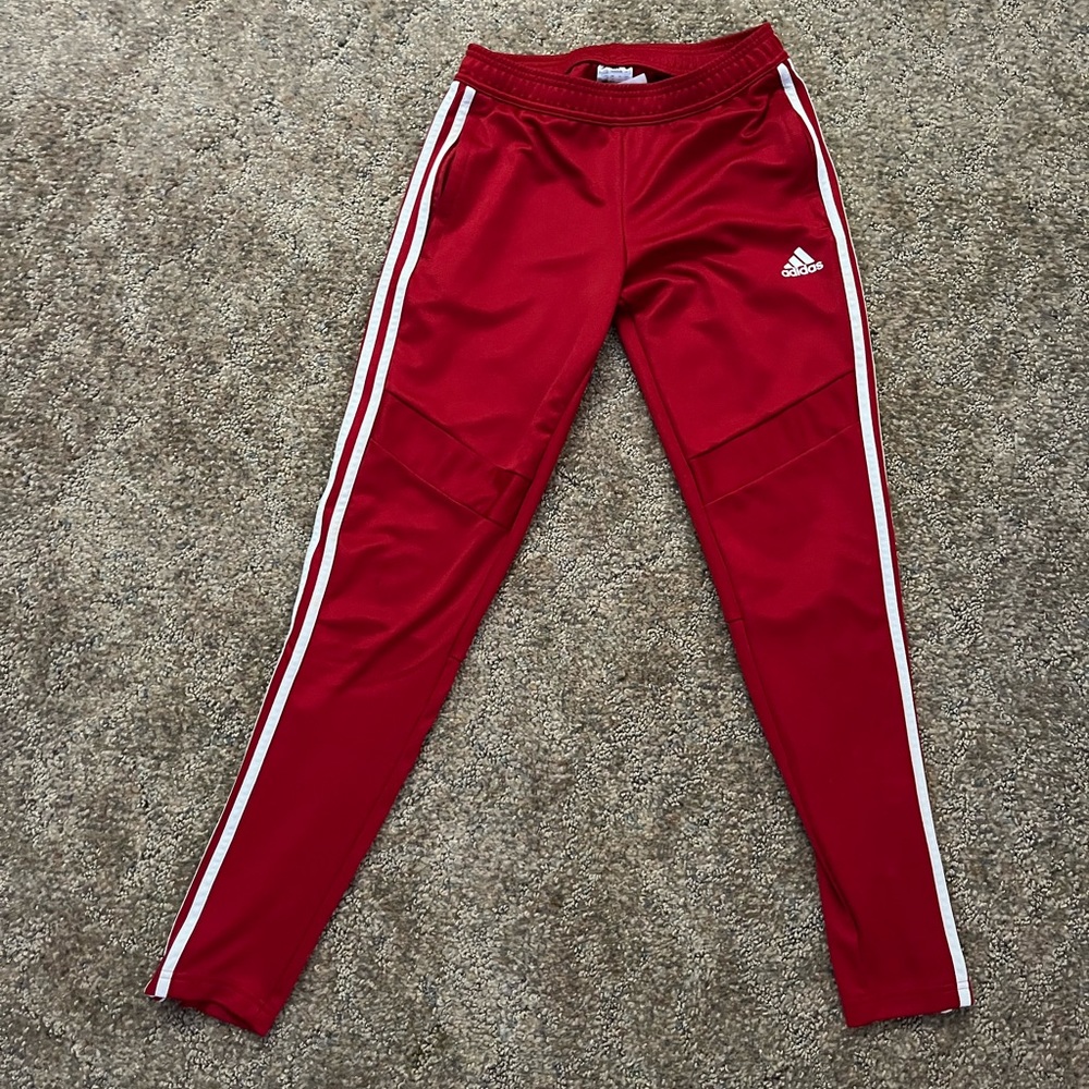 I am selling red adidas track pants